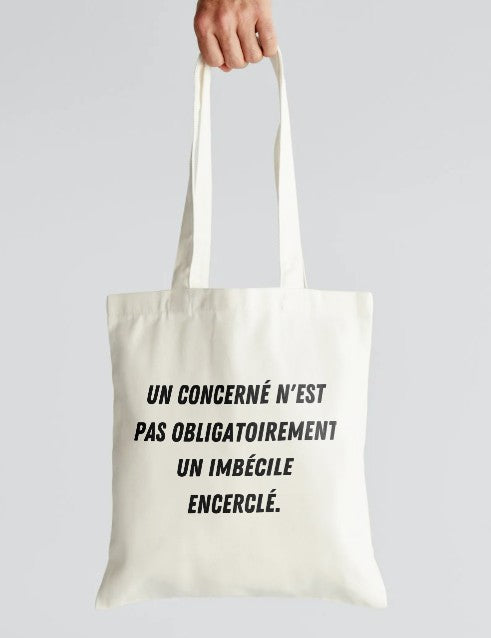 Tote bag - humour - "Un concerné n'est pas obligatoirement un imbécile encerclé"